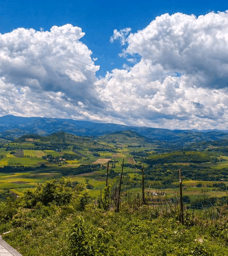 Green cultivated hills and valley around Fort Ternan, viewed from Glamp Kenya